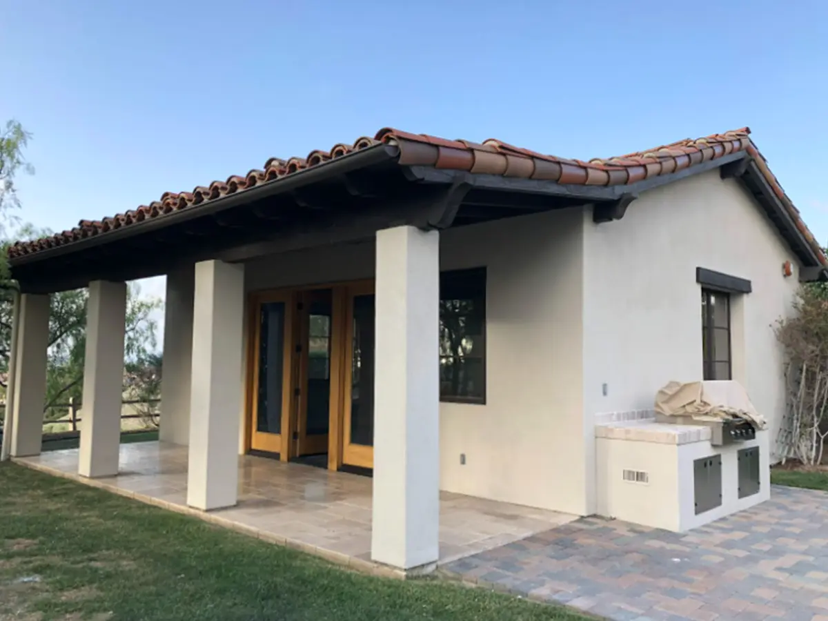 A home addition with a paved patio